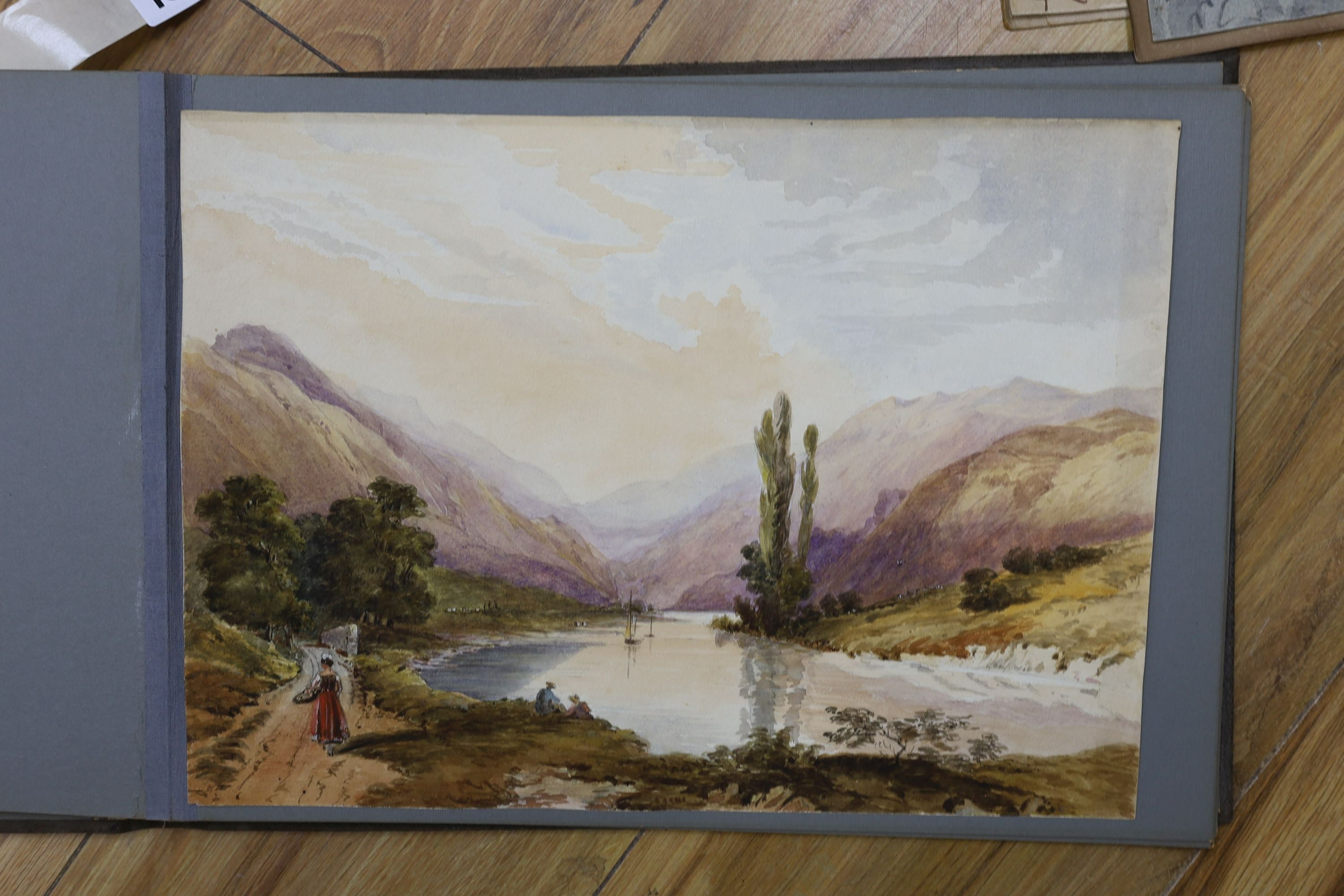 An album of mainly 19th century watercolour landscapes, various artists but including a portrait of an Italian woman monogrammed FG, 33 x 25cm and a Victor Wellersley, North African town scene, 25 x 35cm